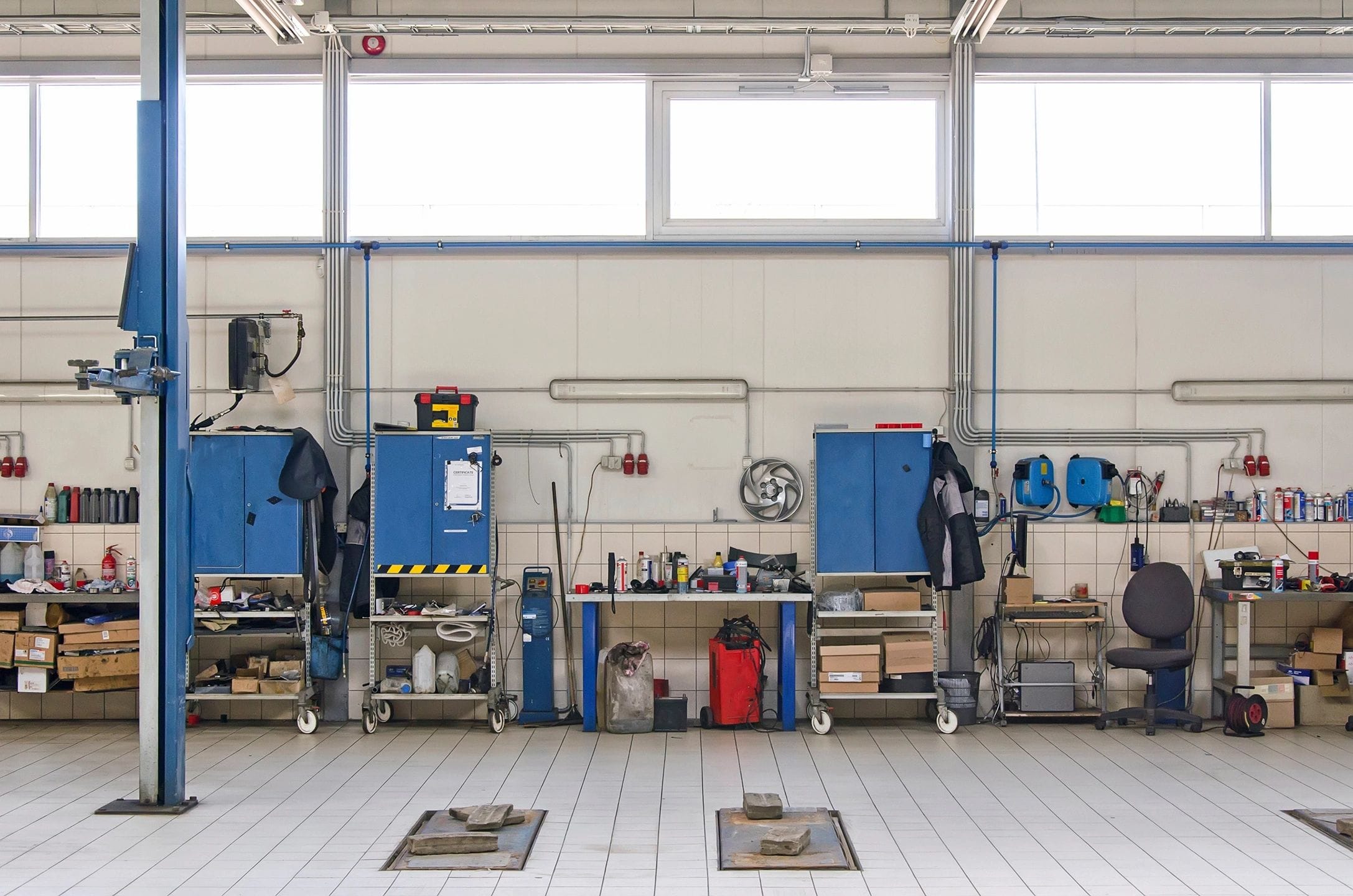 Clean and organized service bay area maintained by professional cleaning services.