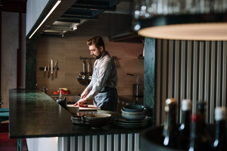 hef preparing food on a clean commercial kitchen counter at a Seattle restaurant
